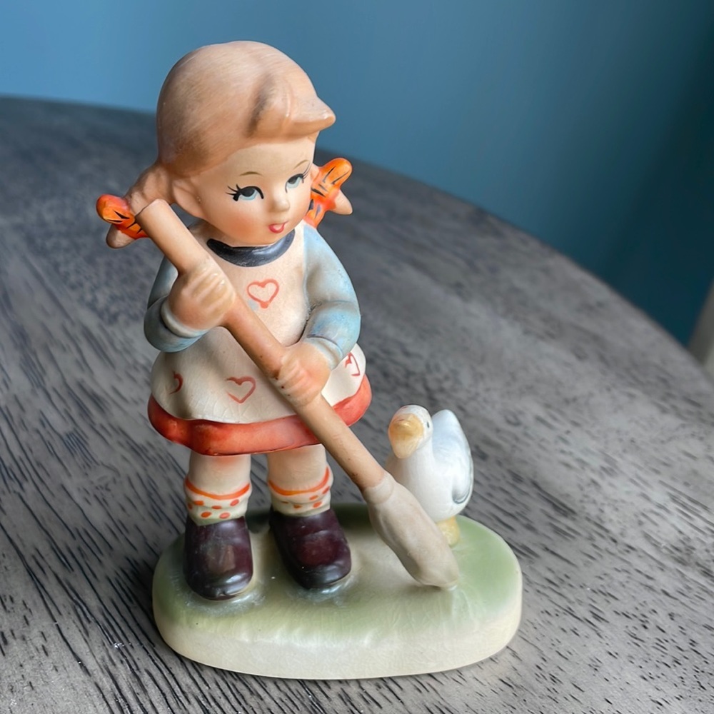 Napcoware Girl With Broom and Duck Figurine